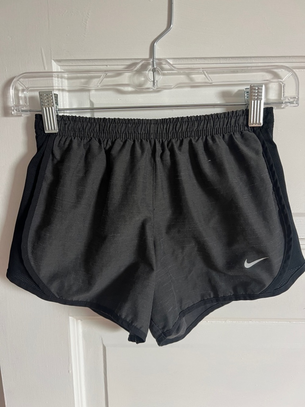 Nike Black Girls' Running Shorts with Silver Swoosh Accent